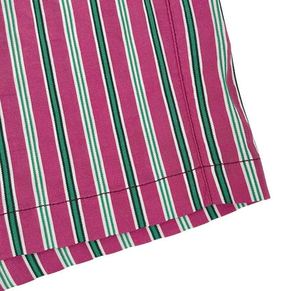 Paul Smith red swim shorts with striped pattern and cotton material.