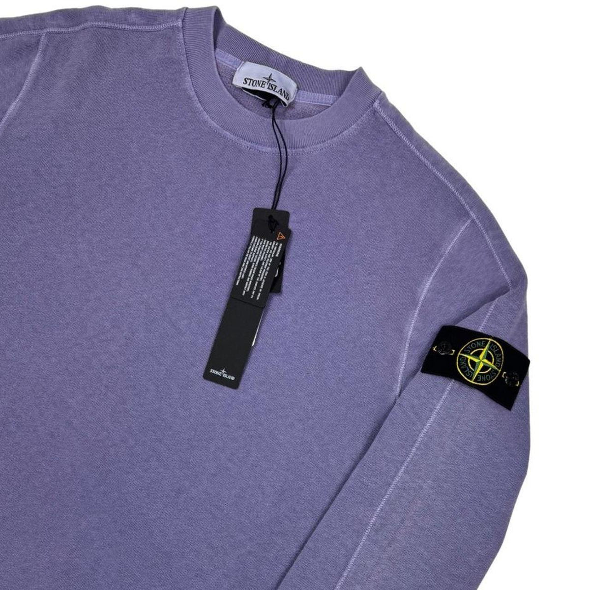 Stone Island purple cotton sweatshirt with logo patch and garment dyed finish.