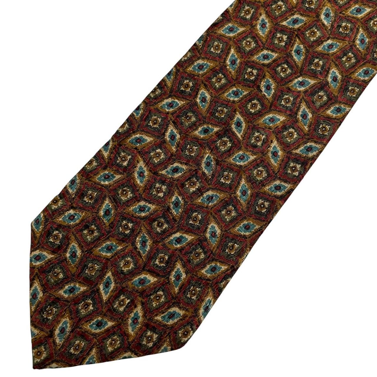 Ermenegildo Zegna multicoloured silk tie with intricate patterns and luxurious sheen.