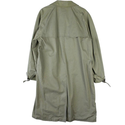 Burberry khaki green trench coat featuring Nova Check pattern and double-breasted design.