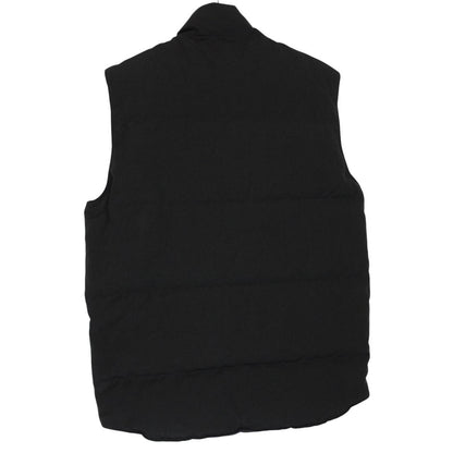 Canada Goose black down gilet with logo patch and zippered pockets.