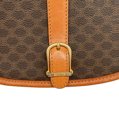CELINE brown and tan duffel bag with Macadam pattern and leather/canvas material.
