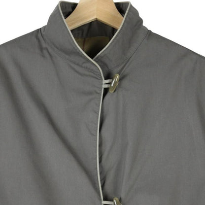 Burberry grey trench coat, single breasted, classic design, vintage 80s style.