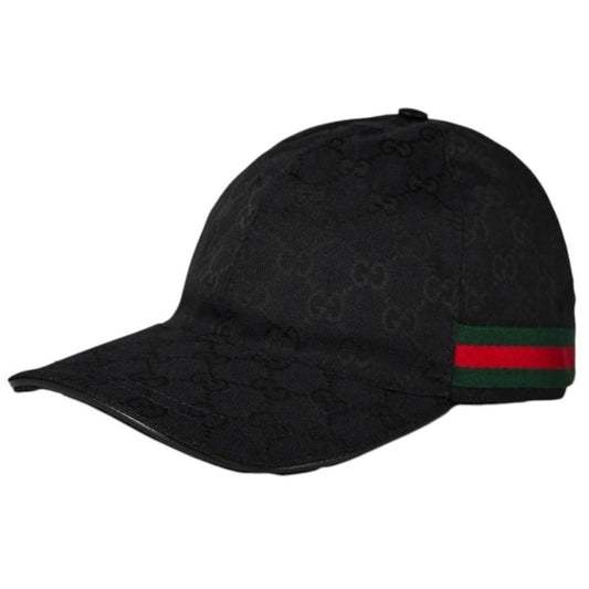 Brand New black apparel with green and red accents, includes dust bag and box.