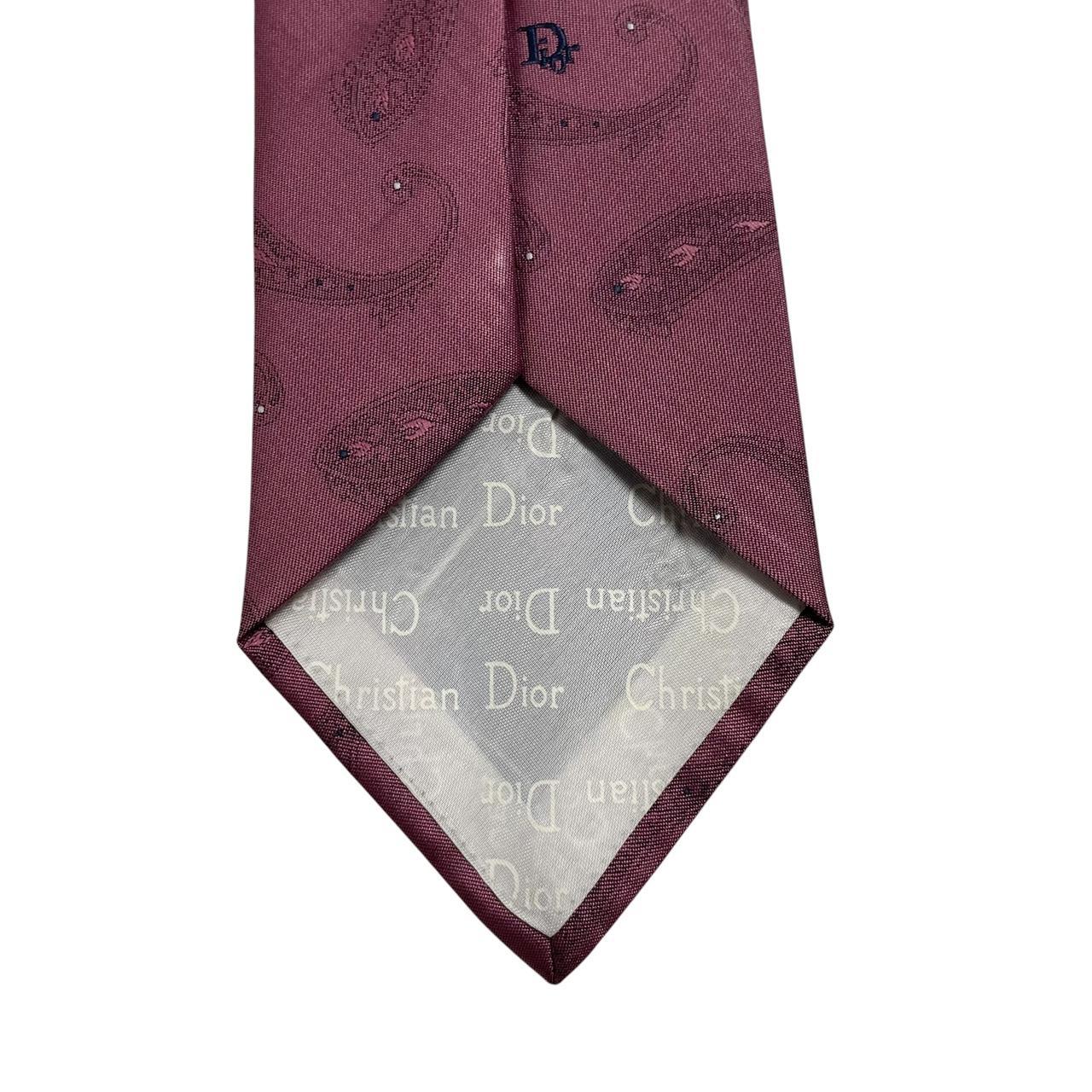 Christian Dior pink paisley print tie made of polyester with intricate pattern details.