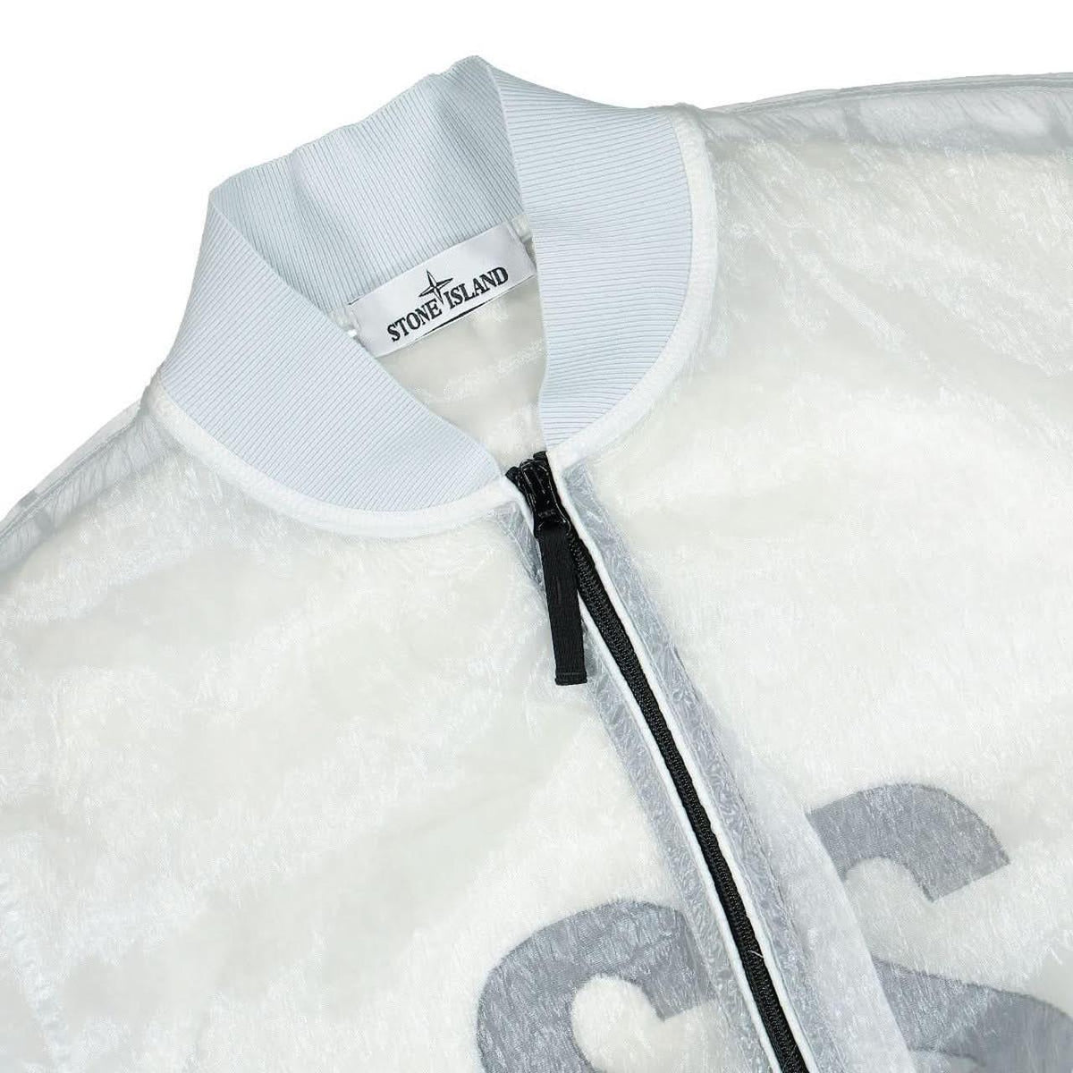 Stone Island bomber jacket ice blue with logo patch and premium fabric details.