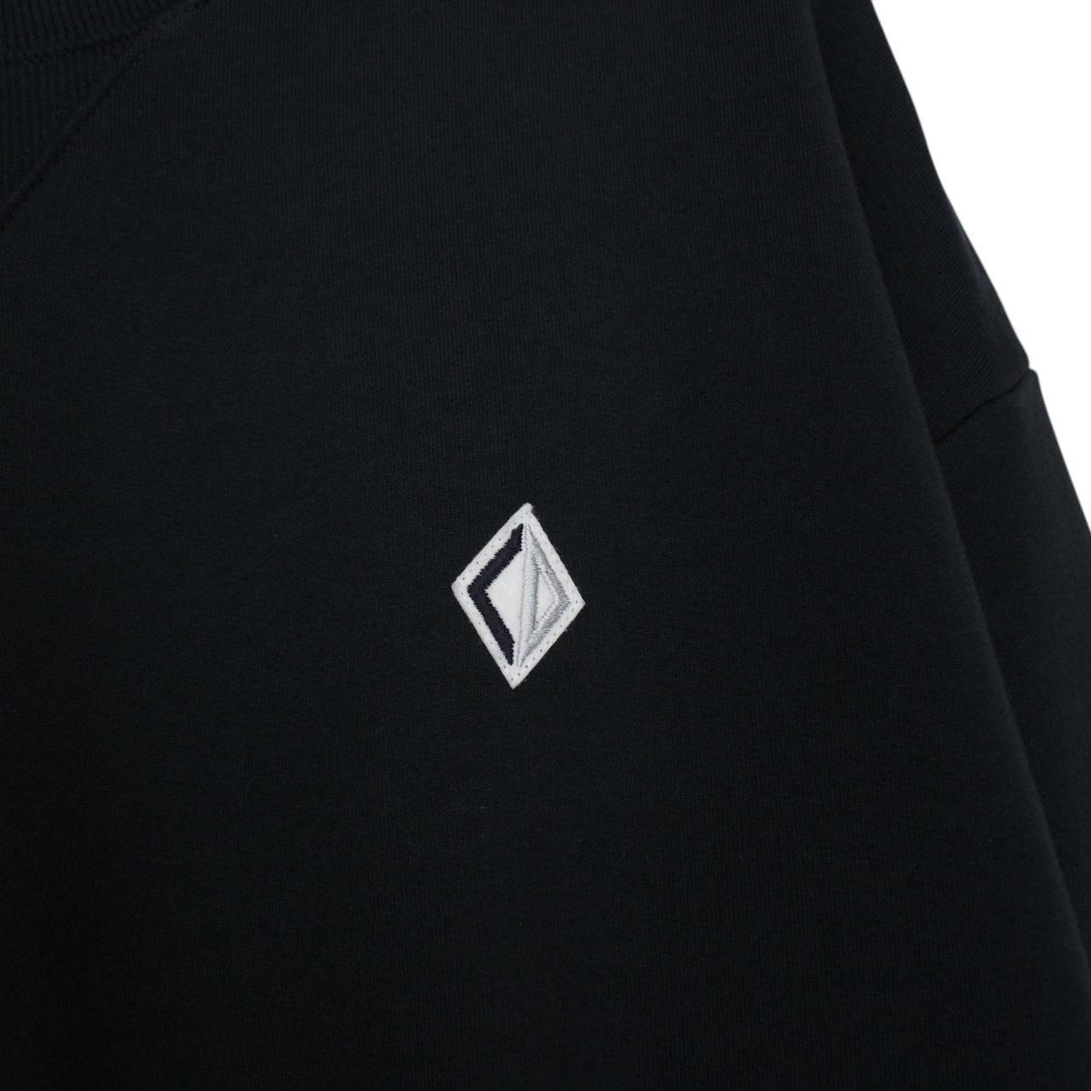 Dior navy blue sweatshirt featuring embroidered CD icon logo on cotton material.