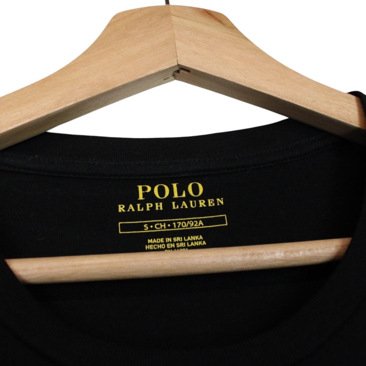 Polo Ralph Lauren black and white pocket t-shirt with logo print and cotton material.