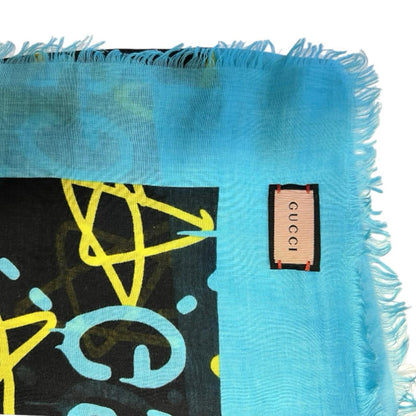 Gucci black and blue modal silk scarf with GG star pattern and logo.