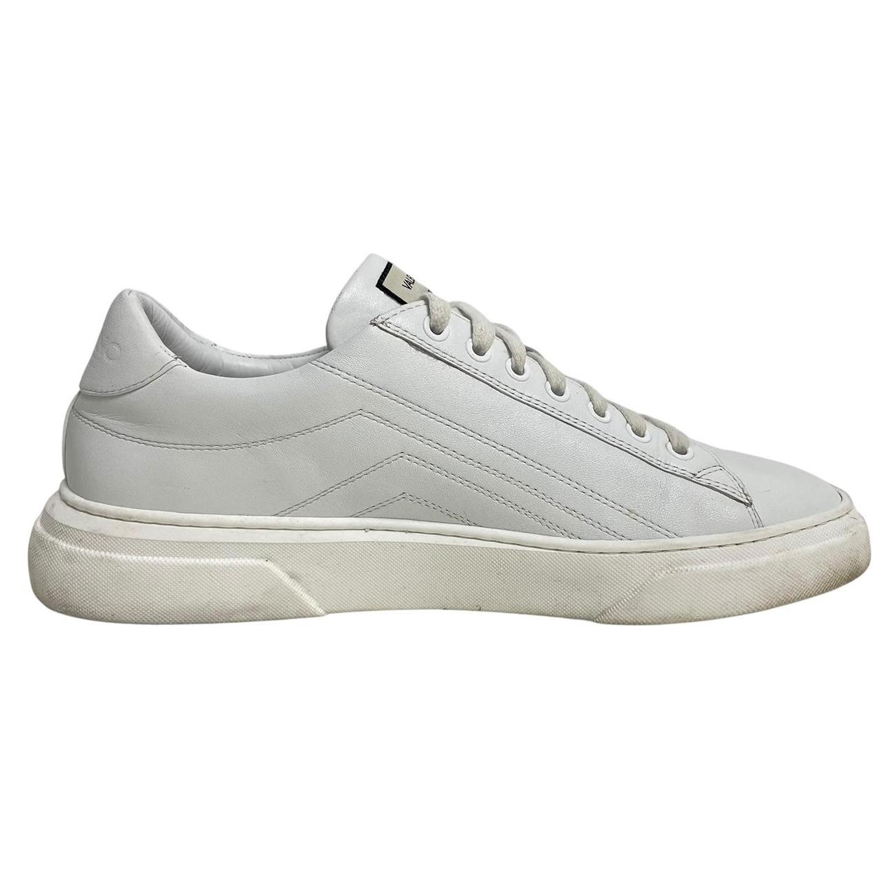 Valentino black and white trainers calfskin leather with logo detail and scuffed soles.