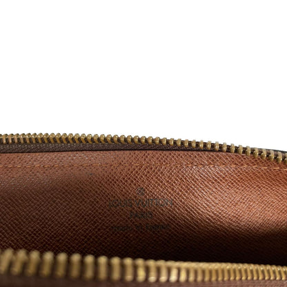 Louis Vuitton duffel bag brown and tan monogram canvas with logo and piping details.
