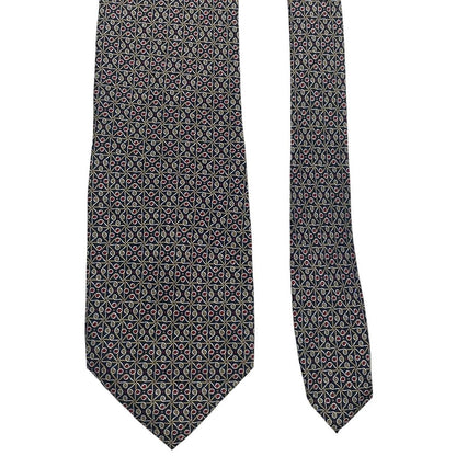 Gucci navy blue silk tie with vintage pattern and logo detail.