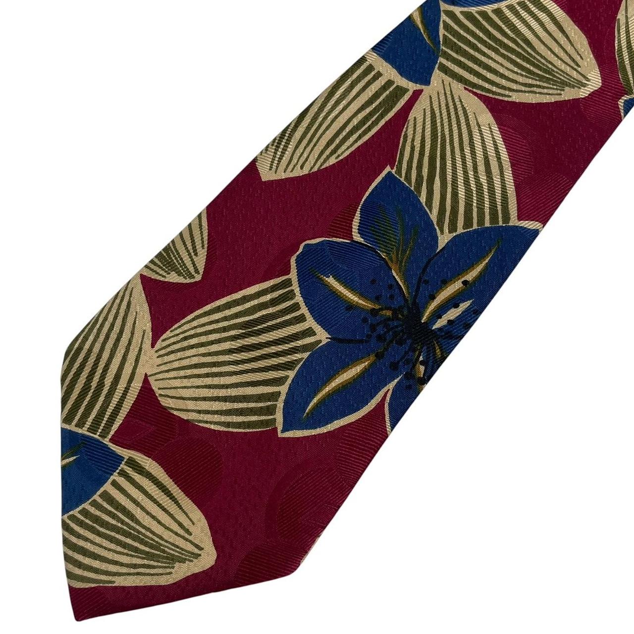 Hugo Boss cream multicoloured floral print silk tie with vibrant patterns and smooth texture.