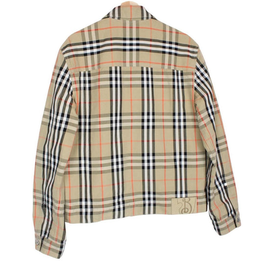 Burberry beige denim jacket featuring iconic Nova Check pattern and logo detail.