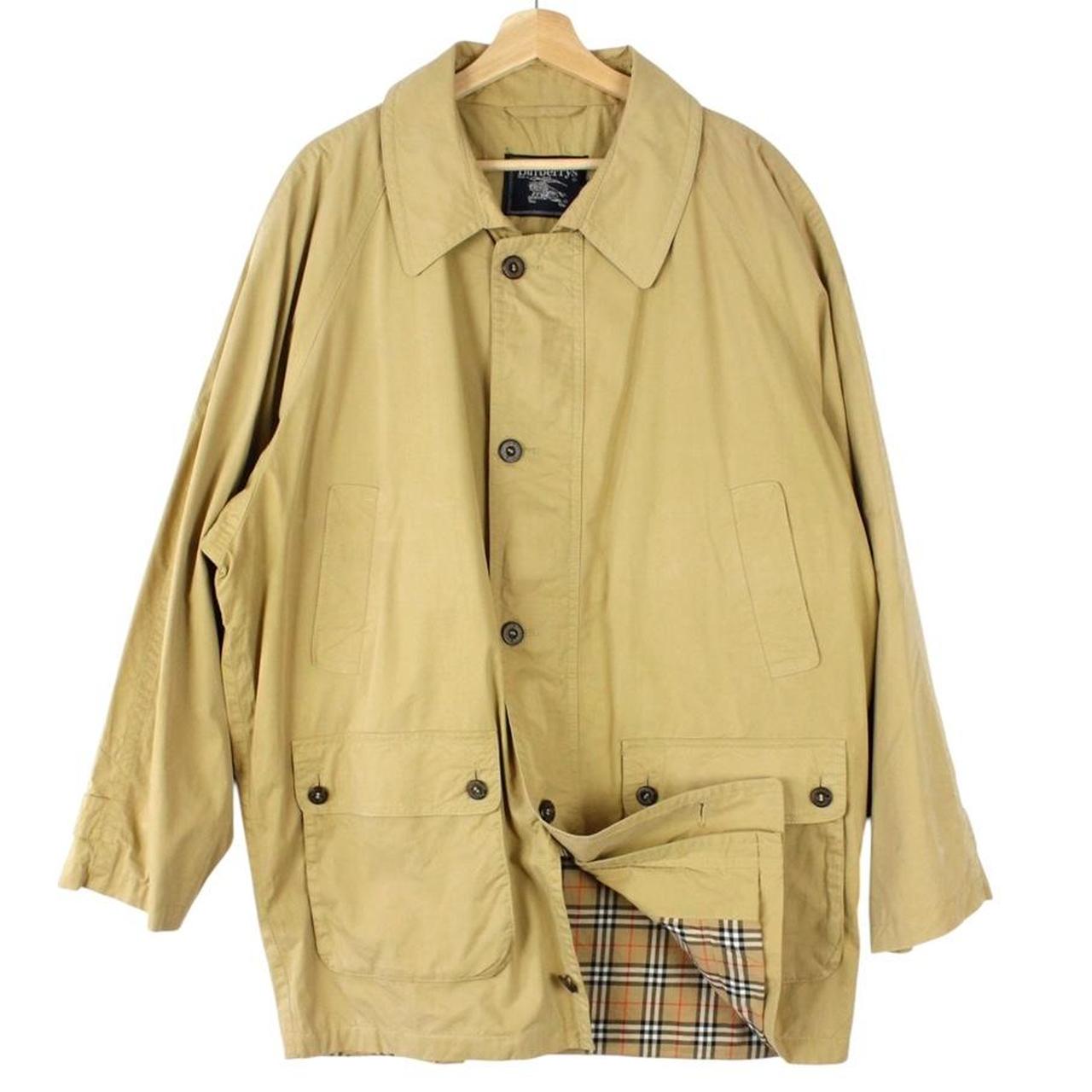 Burberry beige coat with Nova Check pattern, multi pockets, and cream lining.