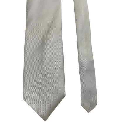 DKNY white silk tie with smooth texture and classic design.