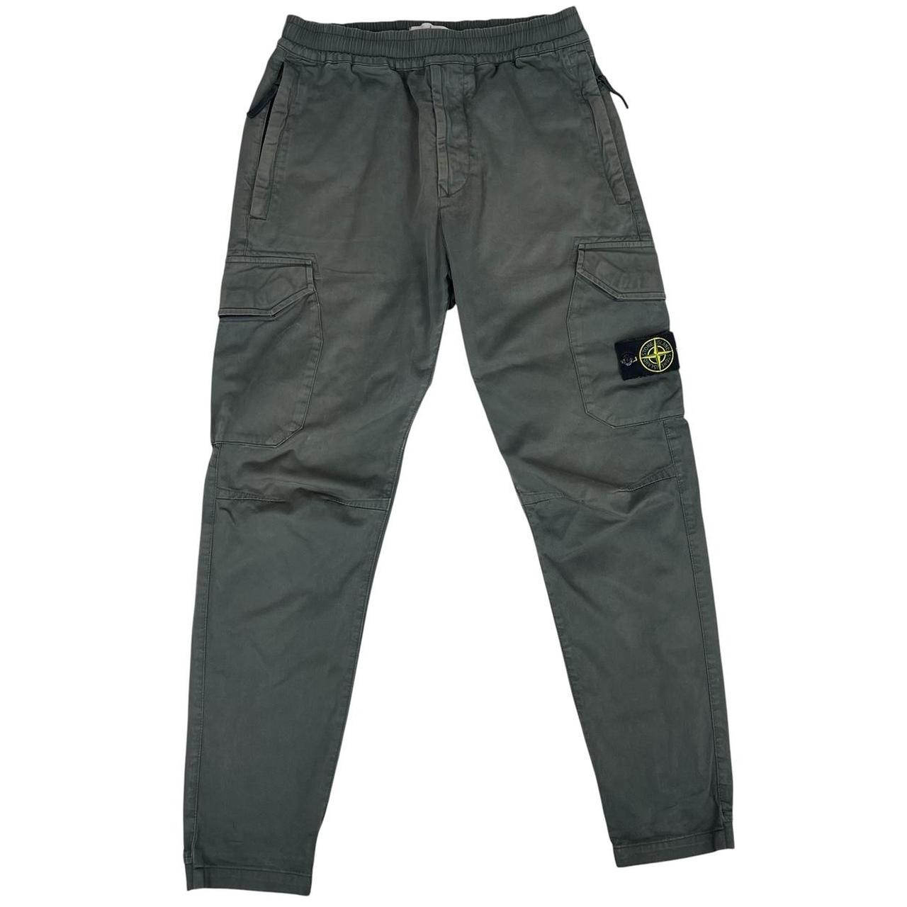 Stone Island grey cargo trousers with logo patch and pockets, visible discolouration.