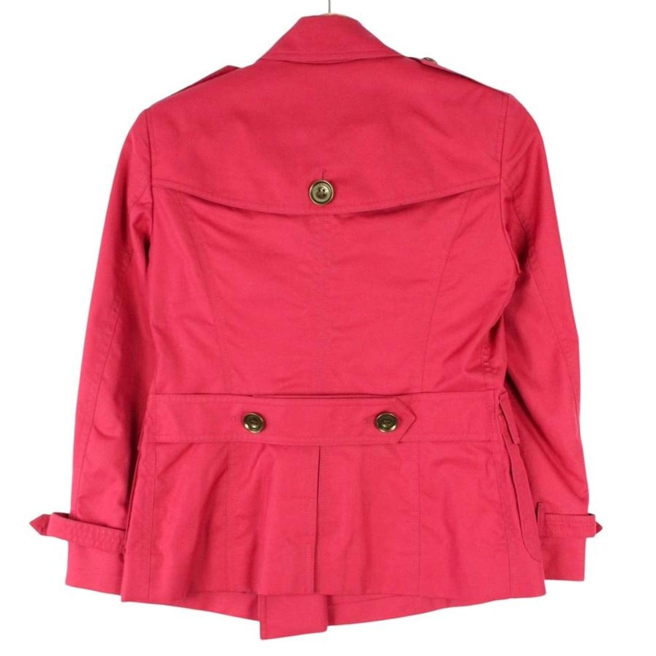Burberry pink double breasted jacket with Nova Check pattern and logo detail.
