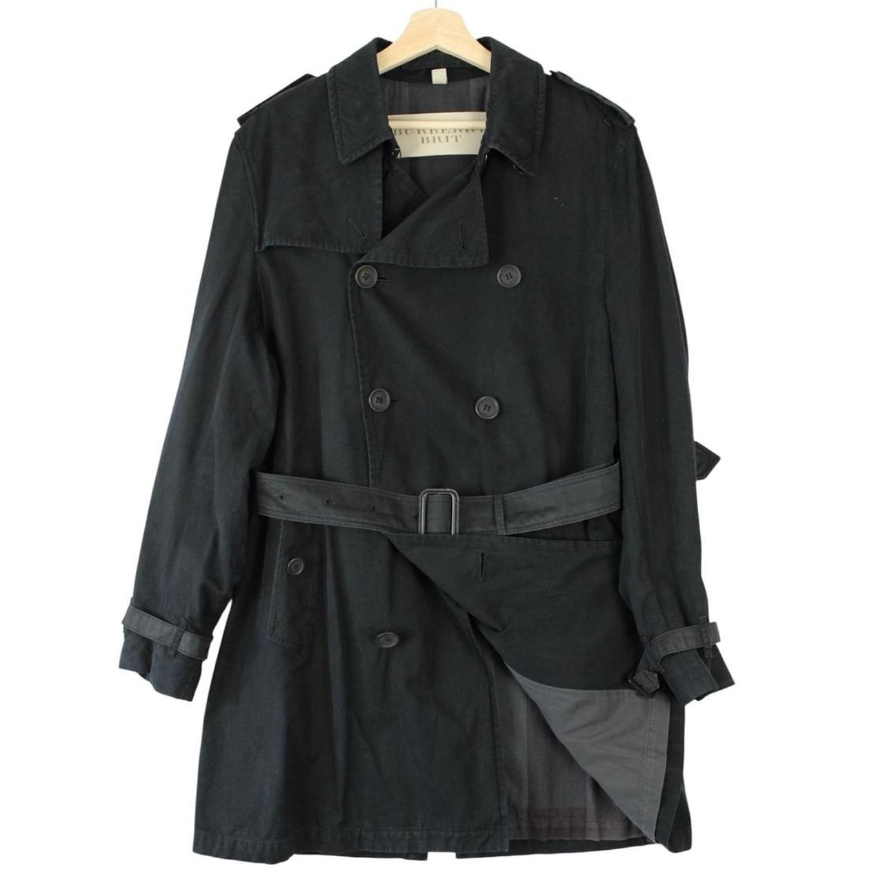 Burberry black trench coat with Nova Check pattern and double-breasted design.