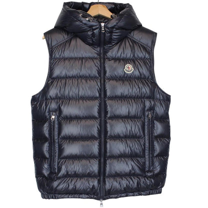 Moncler navy blue hooded nylon down gilet with logo and quilted texture.