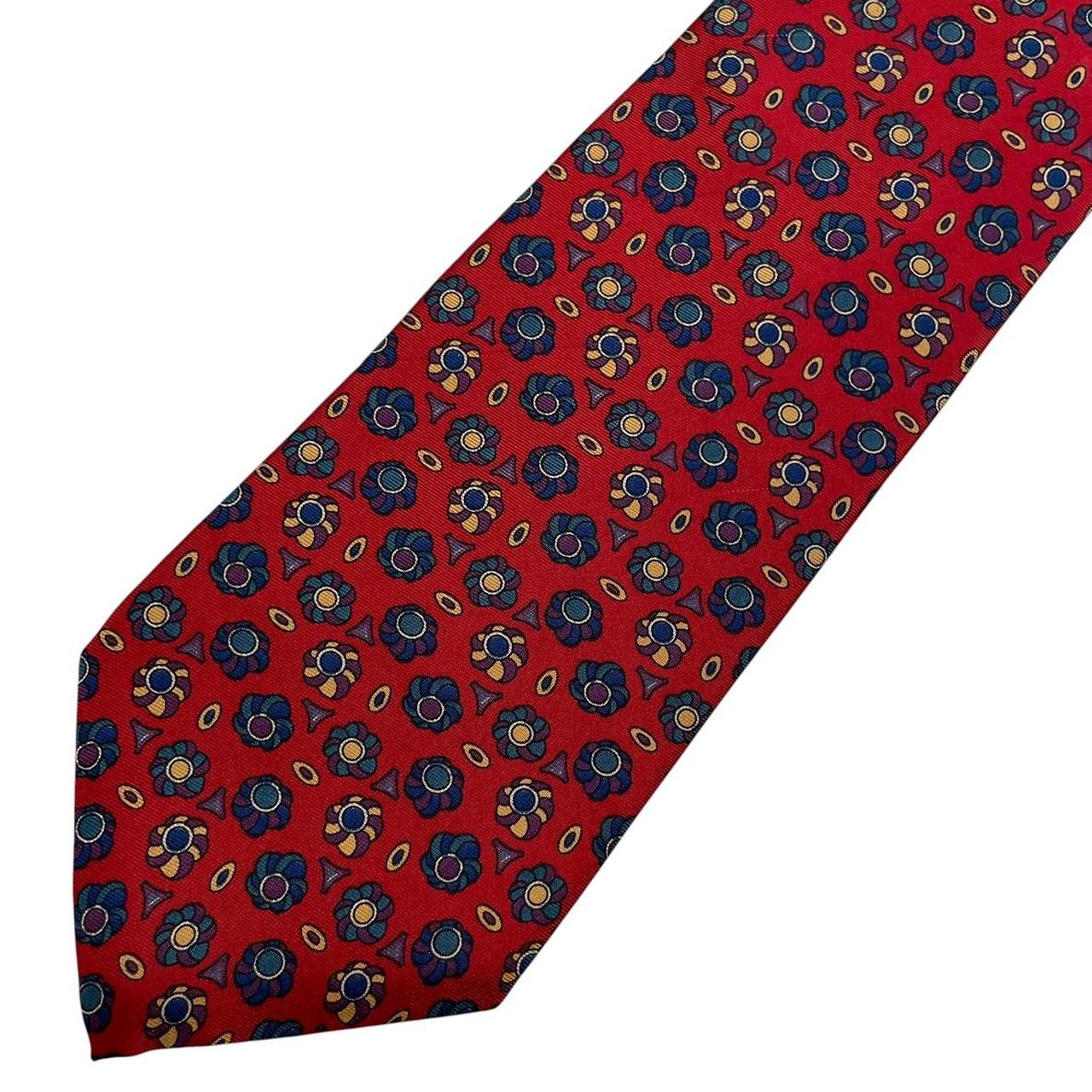 Christian Dior multicoloured silk tie featuring intricate patterns and luxurious sheen.