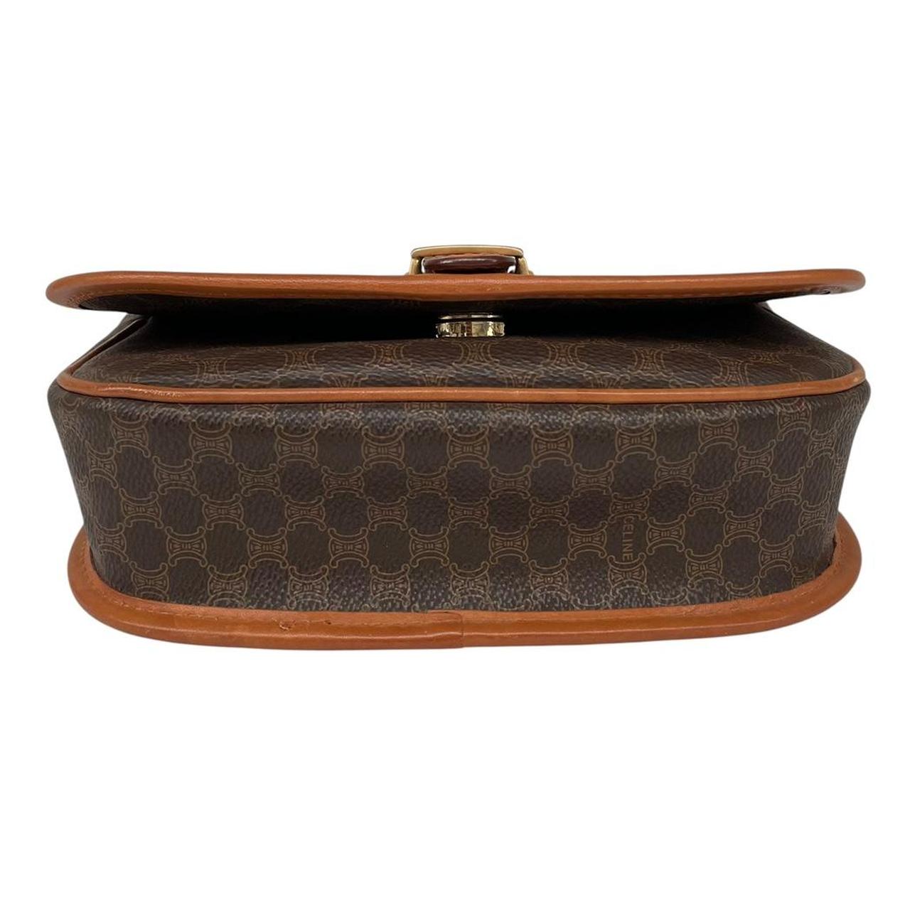 CELINE brown and tan duffel bag with Macadam pattern and leather/canvas material.