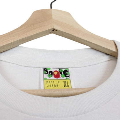 BAPE white graphic t-shirt featuring Spongebob Milo Bob print and pocket detail.