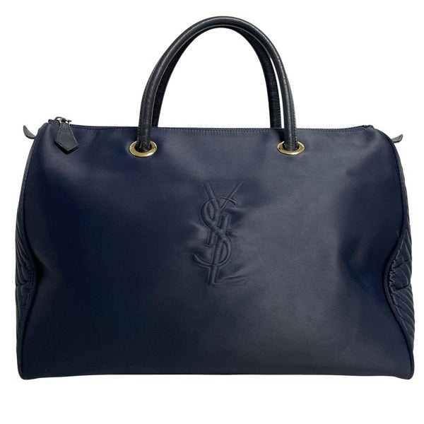 Yves Saint Laurent navy blue duffel bag embossed logo nylon material with handles.