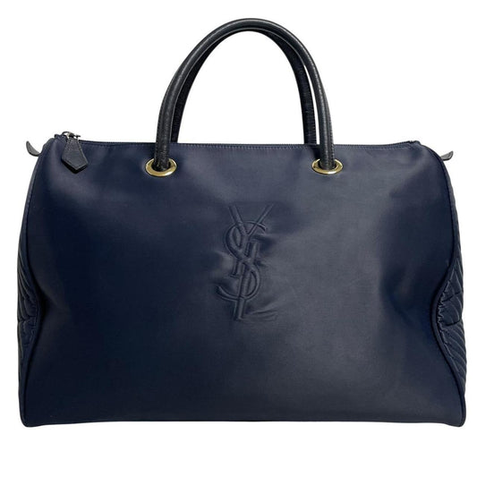 Yves Saint Laurent navy blue duffel bag embossed logo nylon material with handles.