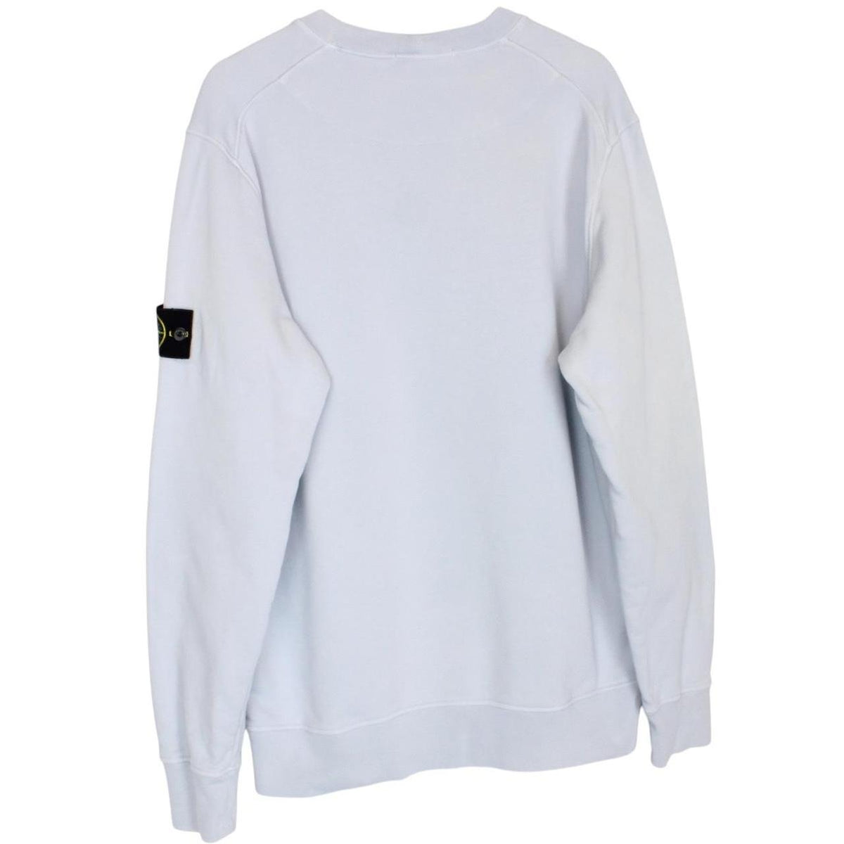 Stone Island blue cotton sweatshirt with logo patch and faded left sleeve.