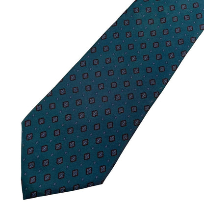 Christian Dior blue silk tie with subtle sheen and classic design.