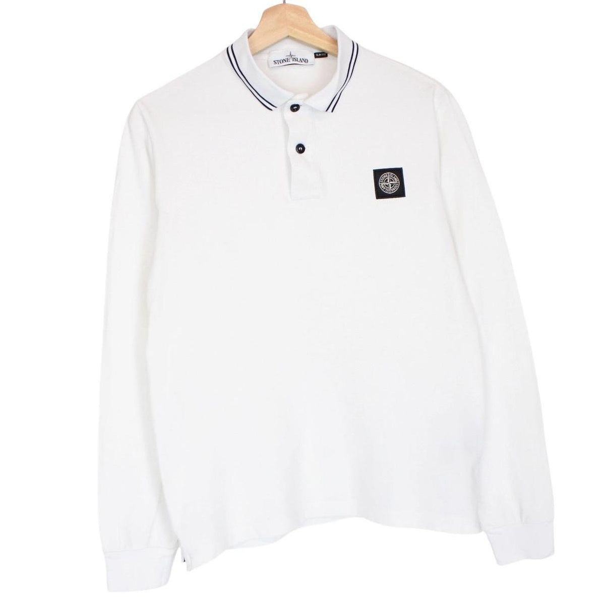 Stone Island white long sleeve polo shirt with compass logo and slim fit design.