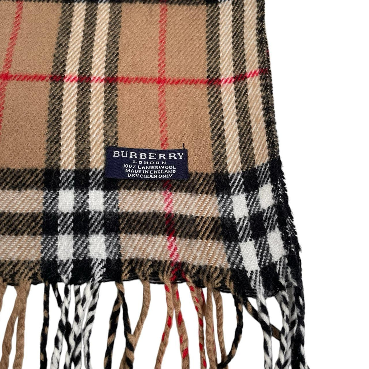 Burberry tan brown lambswool scarf featuring classic Nova Check pattern.