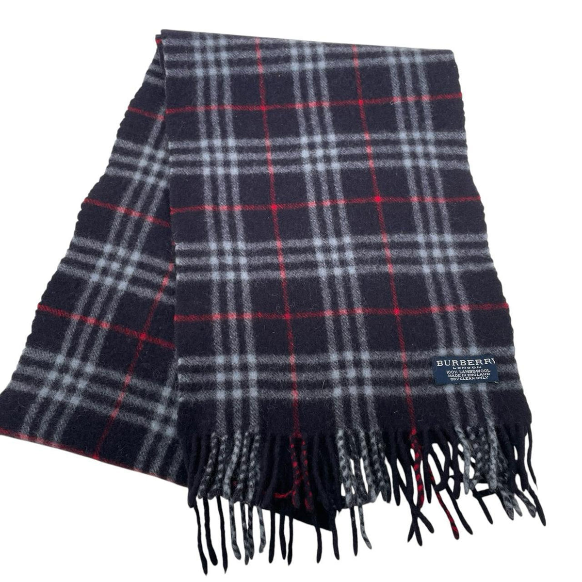 Burberry navy blue lambswool scarf with classic Nova Check pattern.