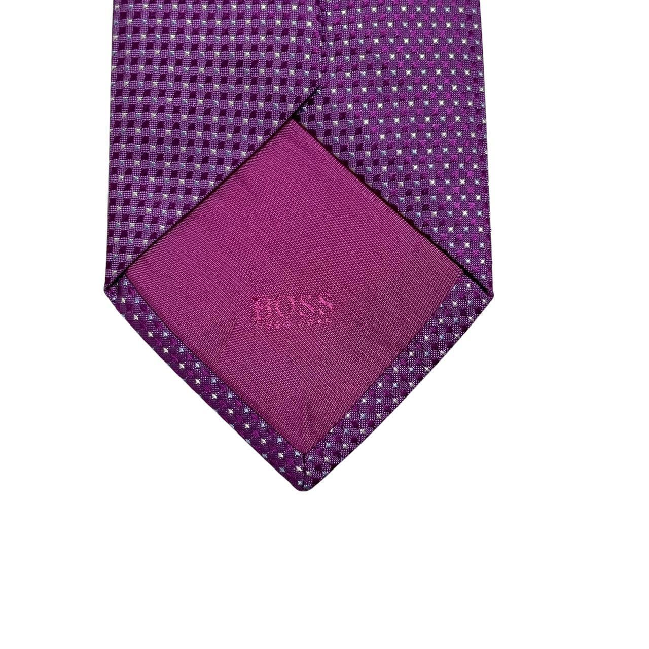 Hugo Boss purple silk tie with smooth texture and subtle sheen.