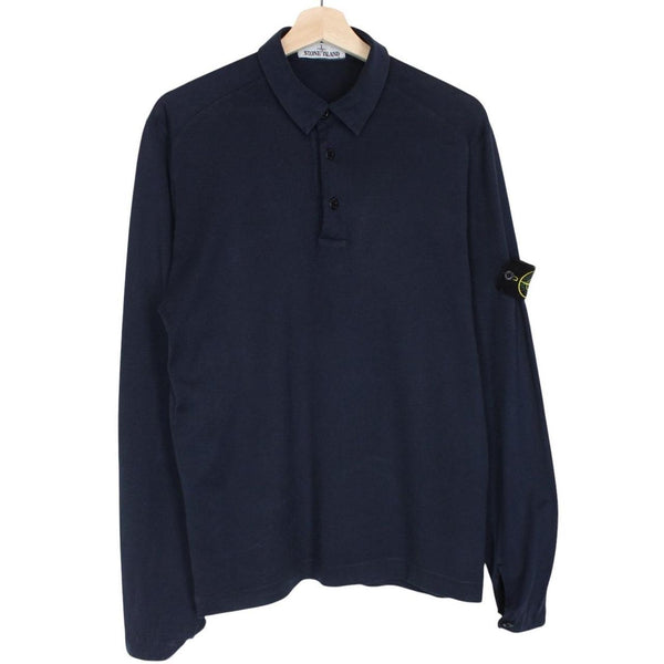 Stone Island navy blue long sleeve polo shirt with iconic compass logo on chest.