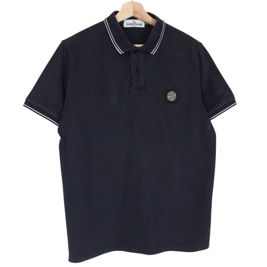Stone Island navy blue short sleeve polo shirt with compass logo and cotton material.