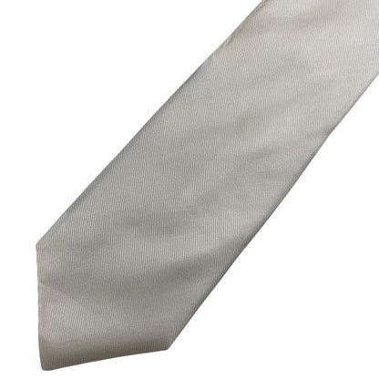 DKNY white silk tie with smooth texture and classic design.