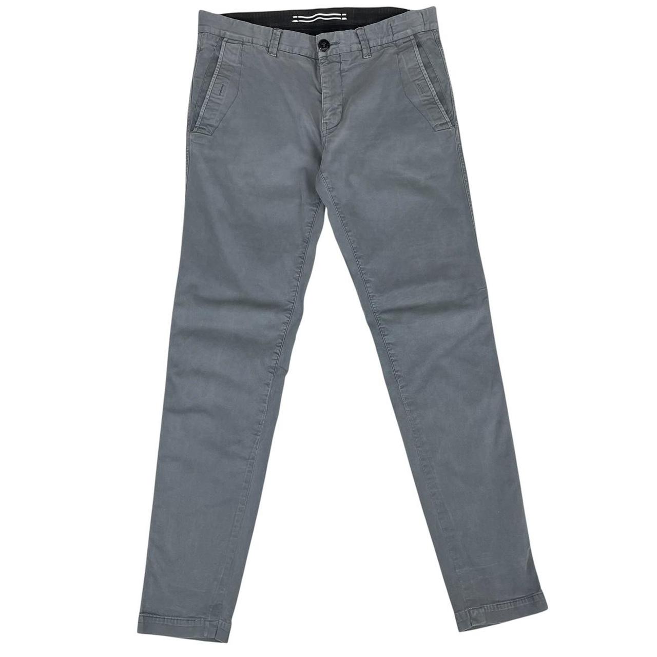 Stone Island grey slim fit cotton trousers with logo patch and classic design.