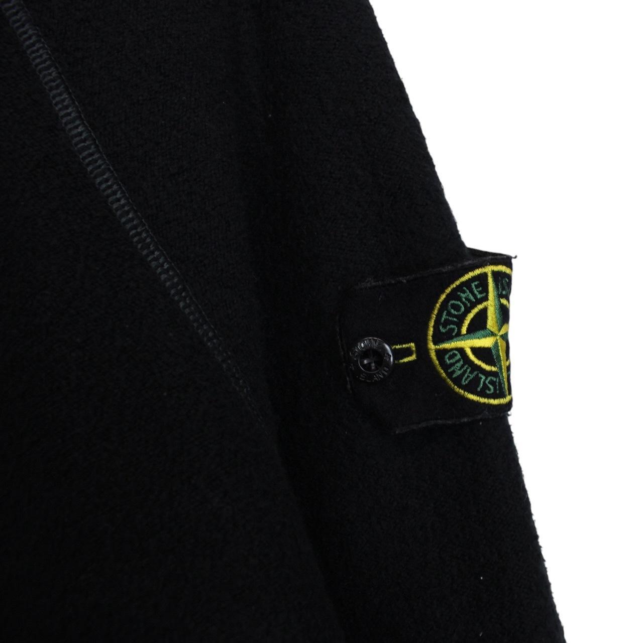 Stone Island black knit jumper with logo badge and cotton/nylon blend material.