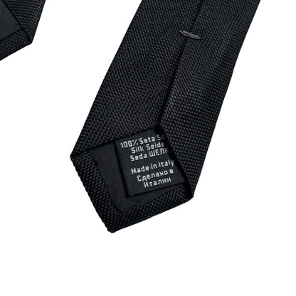 Hugo Boss black silk tie with subtle sheen and classic design.