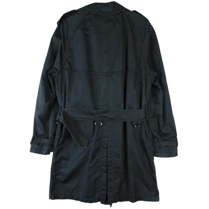 Burberry beige double breasted belted trench coat with classic check lining and logo detail.
