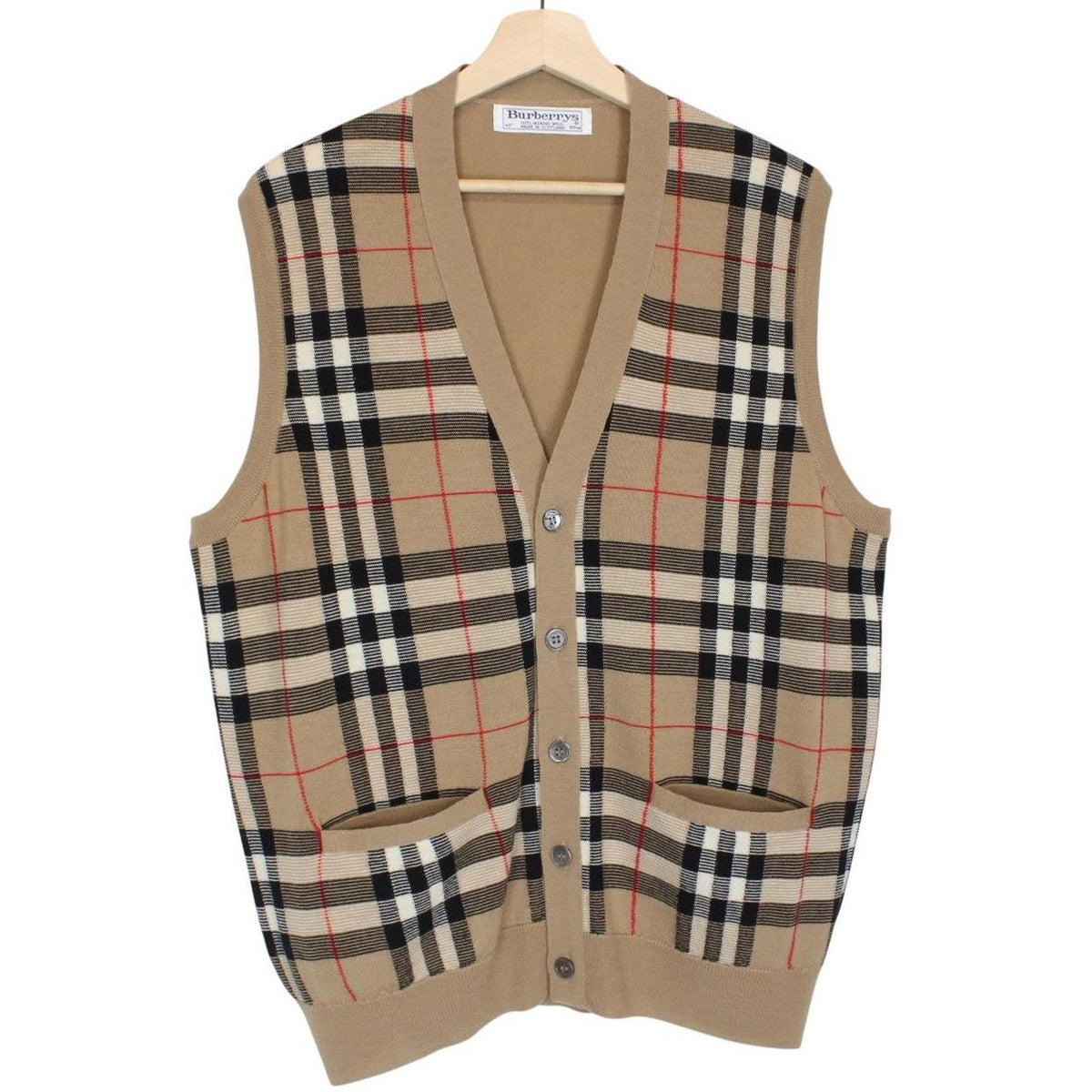 Burberry beige knit sweater vest with Nova Check pattern and merino wool material.