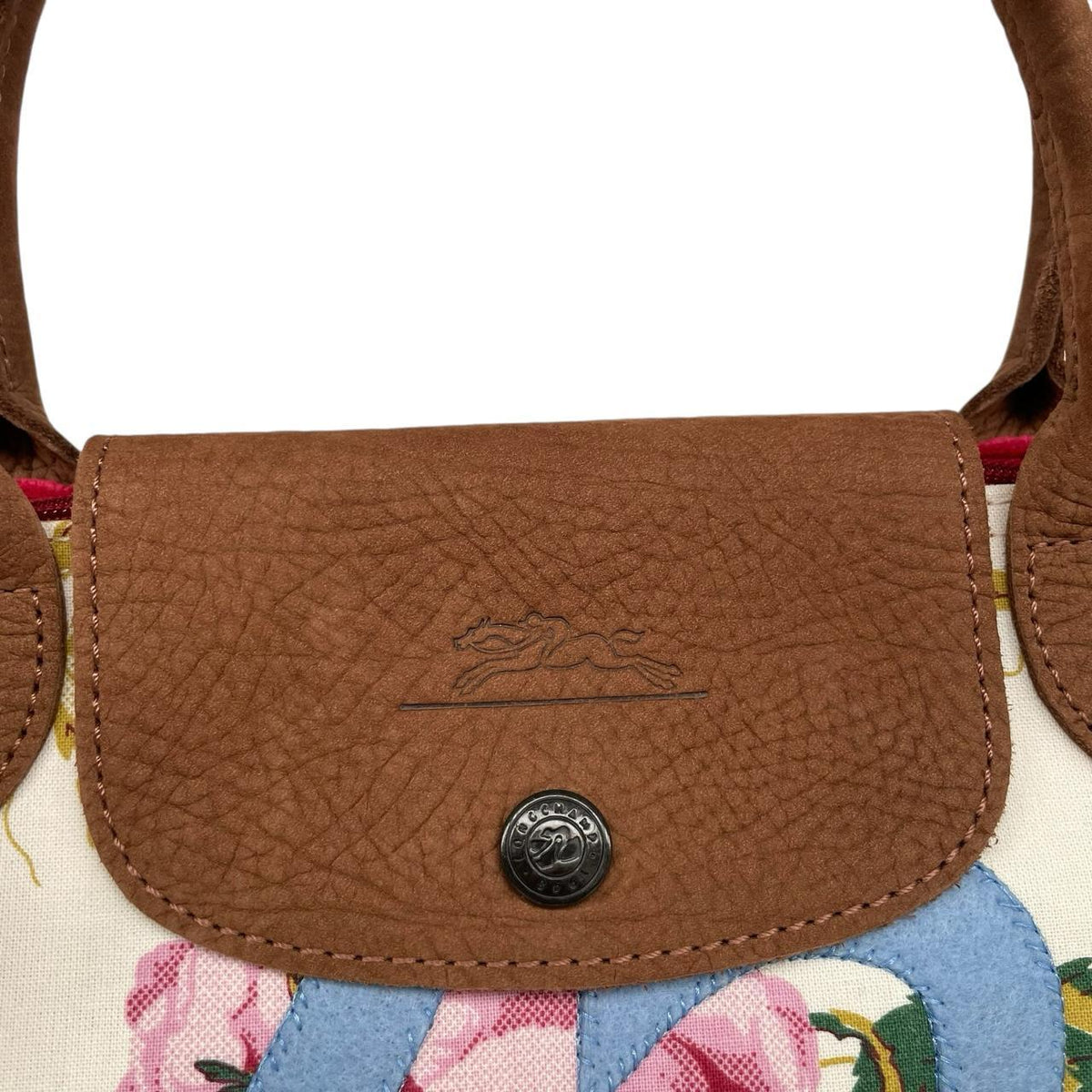 Longchamp multi tote bag featuring Tracey Emin artwork and iconic foldable design.