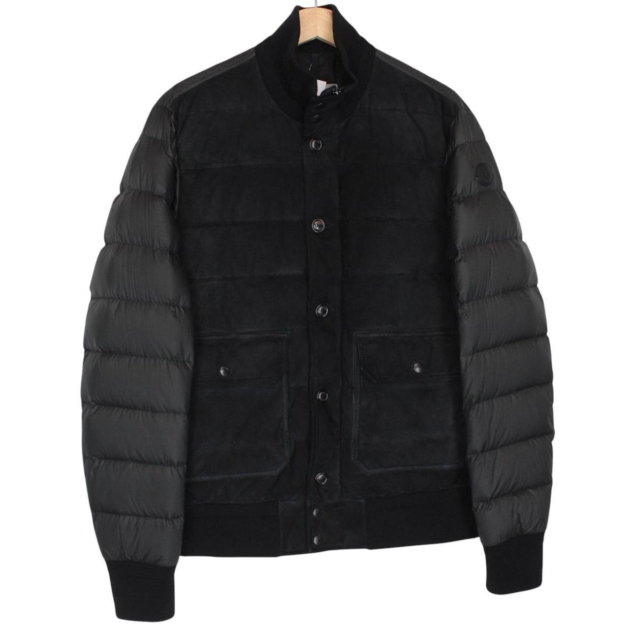 Moncler black suede leather down jacket with full zip and missing badge detail.