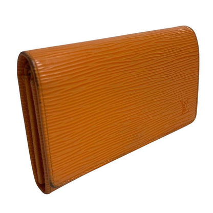 Louis Vuitton orange leather wallet with Epi texture and embossed logo detail.