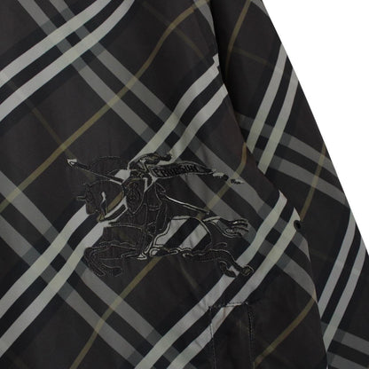 Burberry reversible jacket in dark grey and black with Nova Check pattern and full zip.