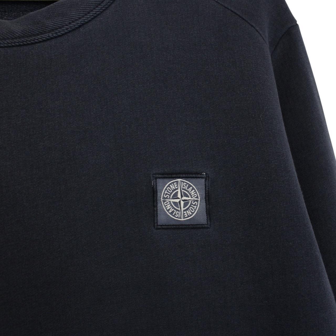 Stone Island navy blue cotton sweatshirt with logo patch and small sleeve repair.