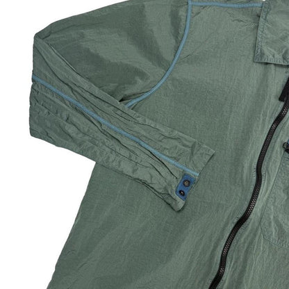 Stone Island green nylon metal overshirt jacket with full zip and logo patch.