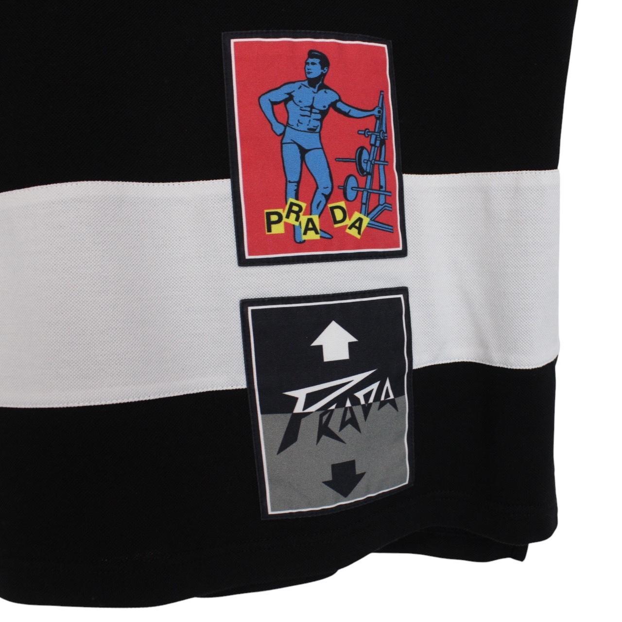 Prada black and white cotton short sleeve t-shirt with logo pocket detail.
